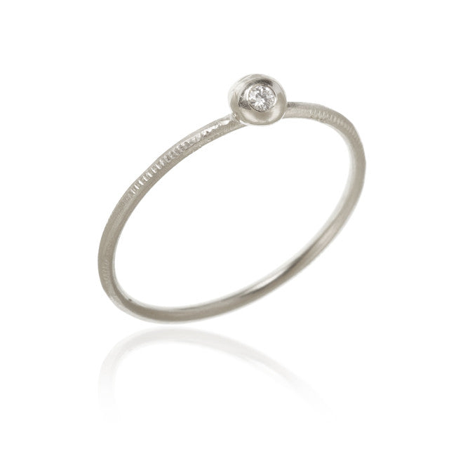 Delphis ring med 1 brillant